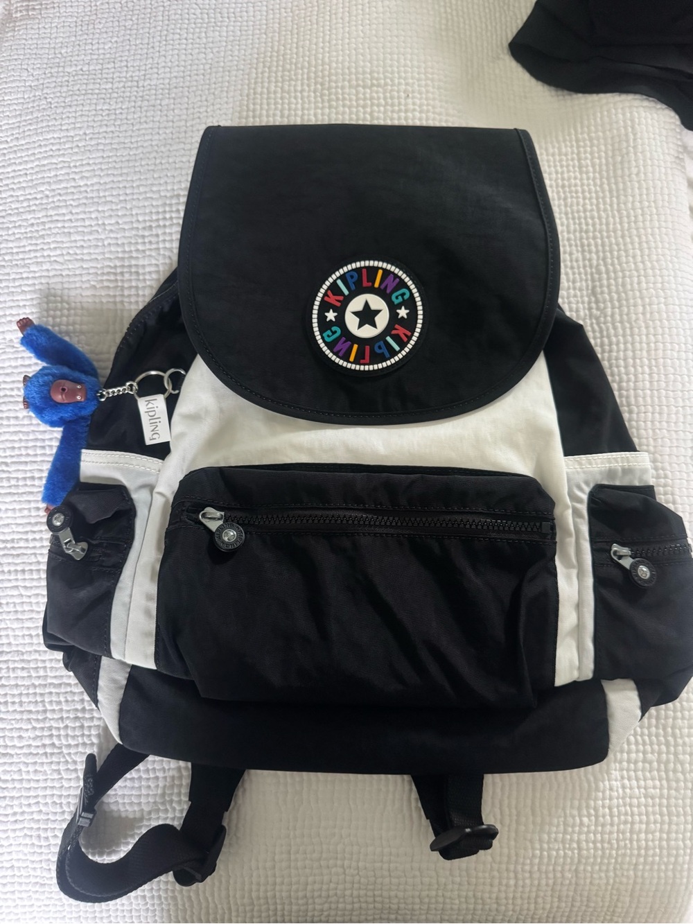 Kipling Ezra Black and White Flap Backpack with Colorful Logo
